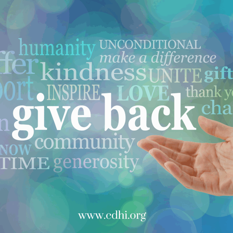 Hand extending toward a large 'give back' word and a cloud of charity-related words on a teal-blue background; includes the URL www.cdhi.org for a charity/volunteer message.